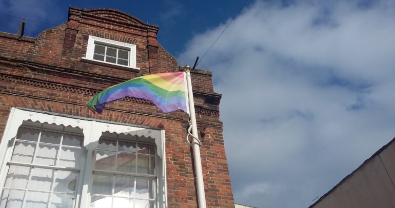 Image for the news article titled Dover Town Council Flies the Rainbow Flag